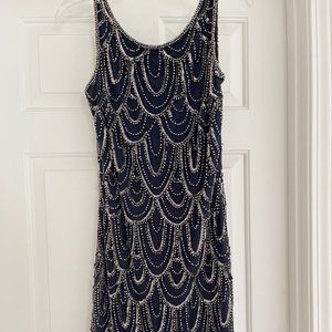 Sleeveless, beaded and sequined Pissaro Nights  navy cocktail dress.